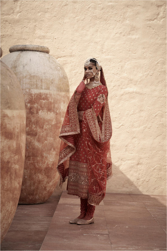 sabyasachi designer dresses 110 Mukherjee Collection ideas Elegant onion color designer salwar suit made with kasturi silk fabrics and intricate designs and fancy collection Sabyasachi Sarees Sabyasachi Party Wear